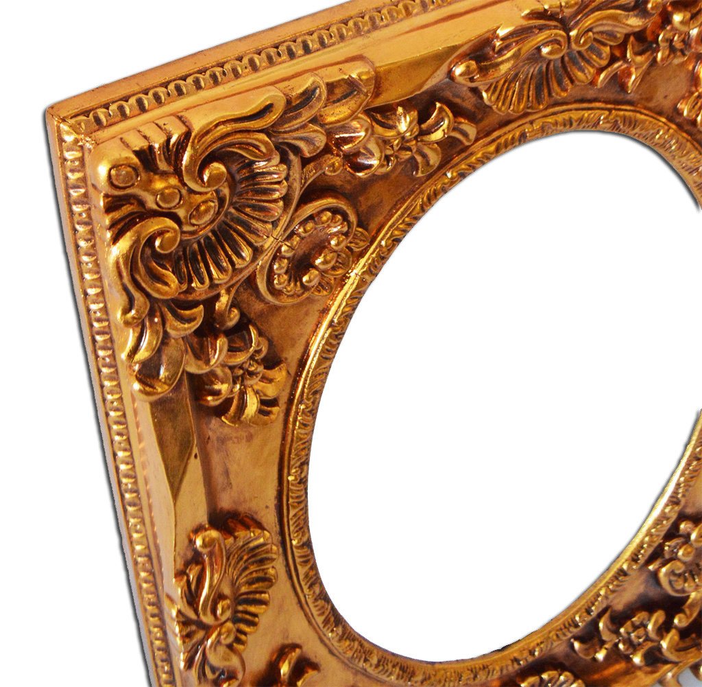 Inner size 28x39 cm, golden frame