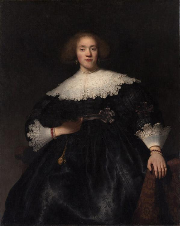 Portrait of a woman with,REMBRANDT Harmenszoon van Rijn,50x40cm